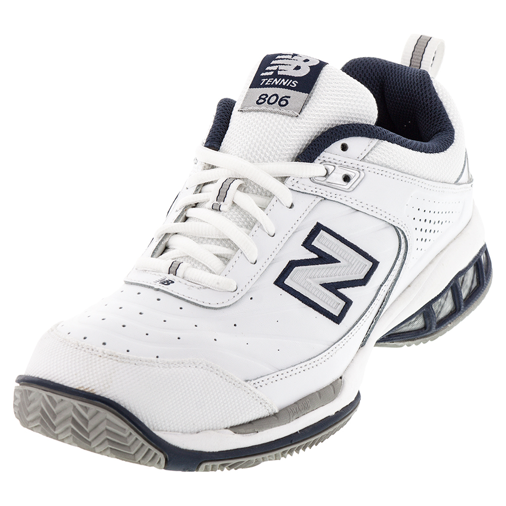 all white new balance tennis shoes