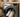 White Tennis Shoes in front load washing machine 