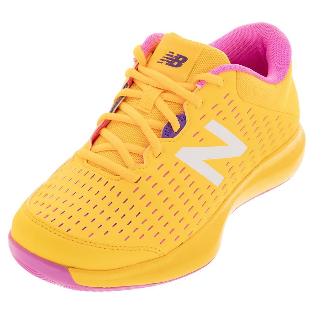 New Balance Women`s 696v4 B Width Tennis Shoes Vibrant Apricot and White