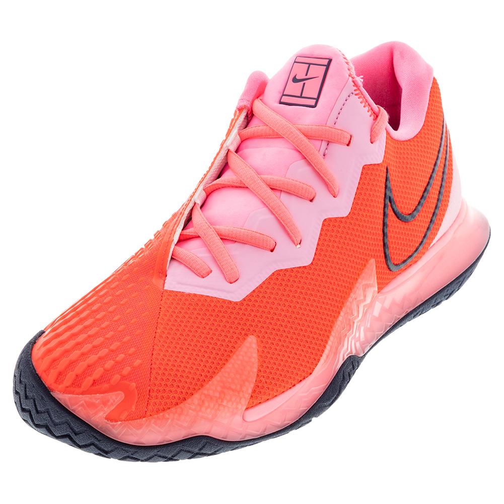pink and orange tennis shoes