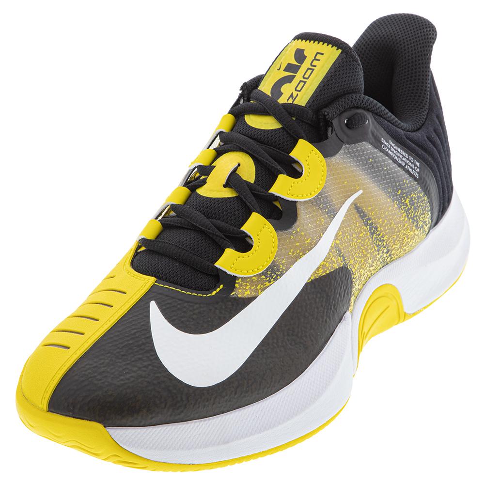 black and yellow nike tennis shoes